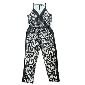 Black brand lace with nude lining jumpsuit size small